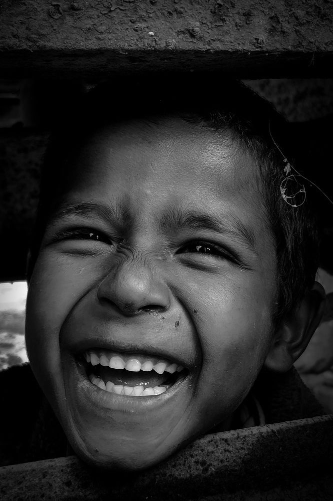 A street child whose eyes are full of dreams.