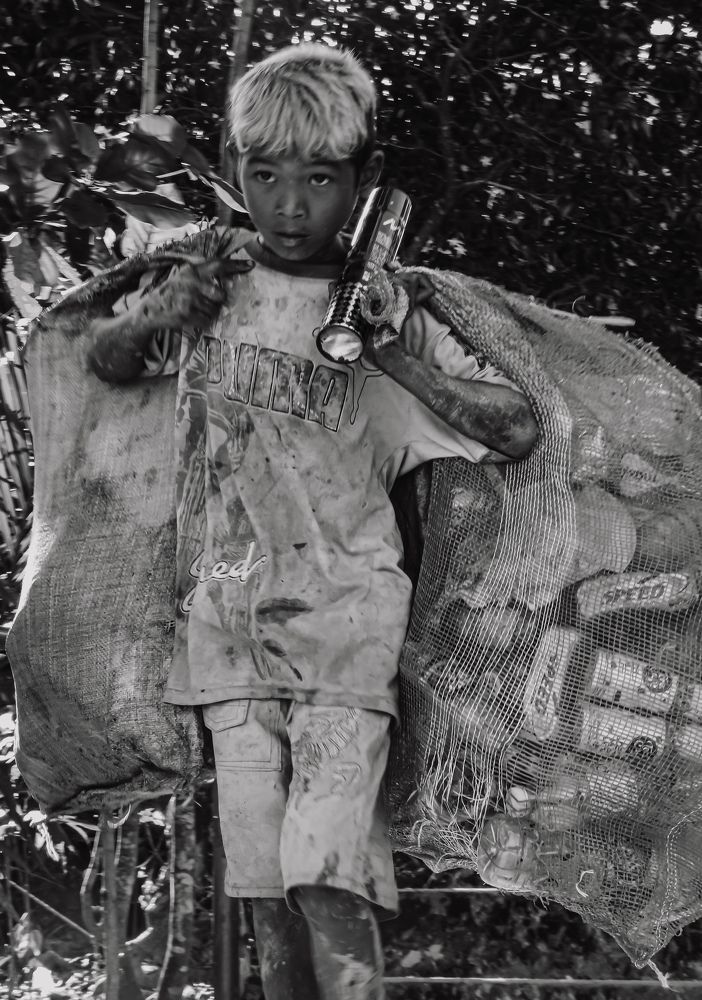 A Child Who collect the bottle tax