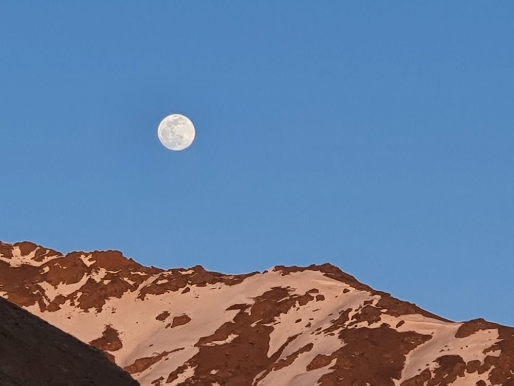 Moonrise at sunset
