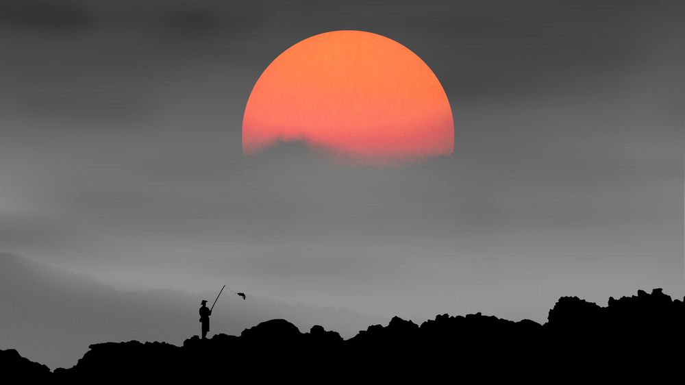 The Fisherman and Fiery Sunrise