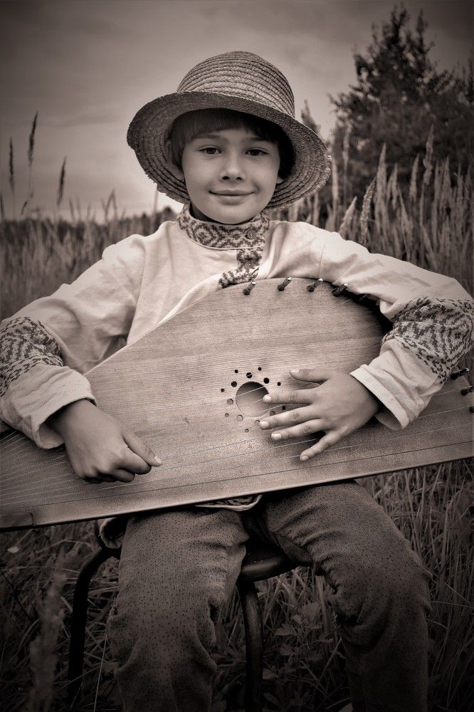 Юный гусляр.