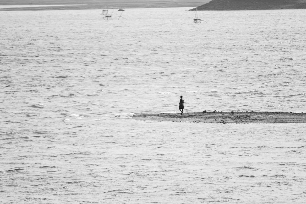 A man Walking On under of the River