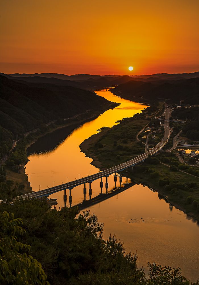 In the middle of the river at sunset