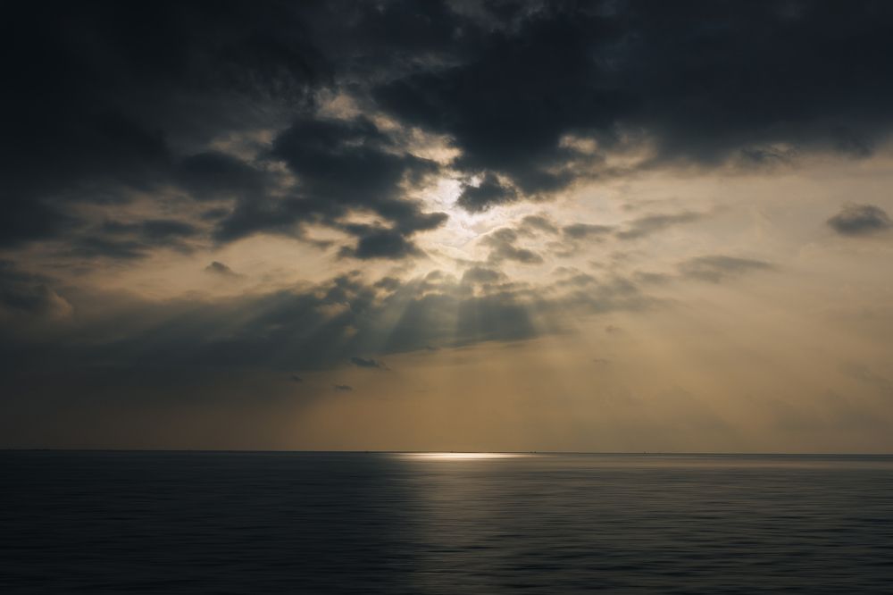 Meet me where the sky touches the sea.