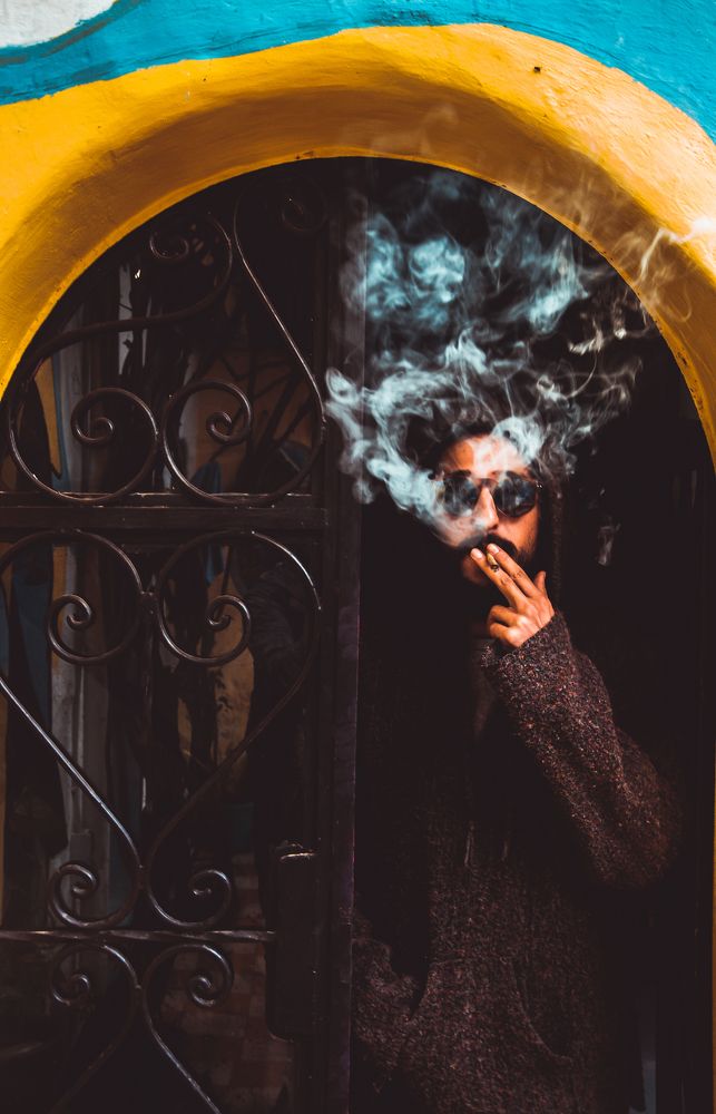 men portrait smoking weed