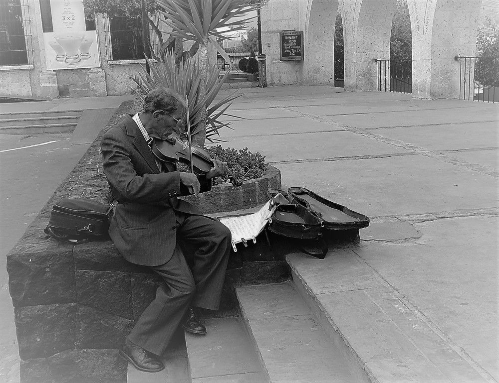 O velho violonista da igreja