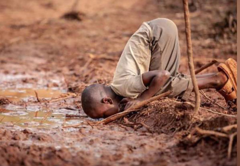 A Child drinking water