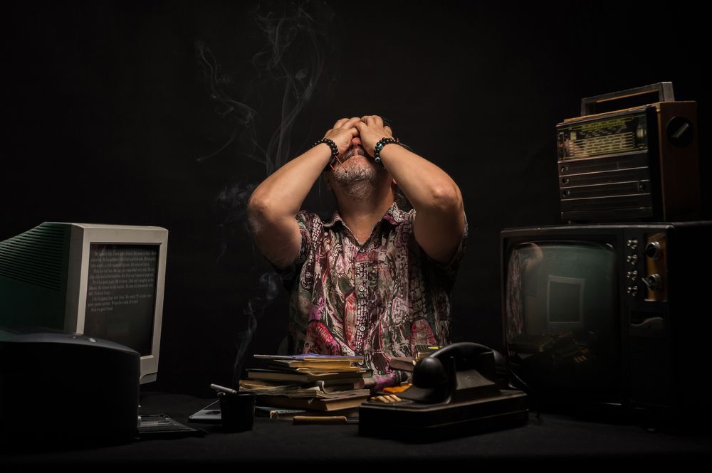 The man is tired of information flows.