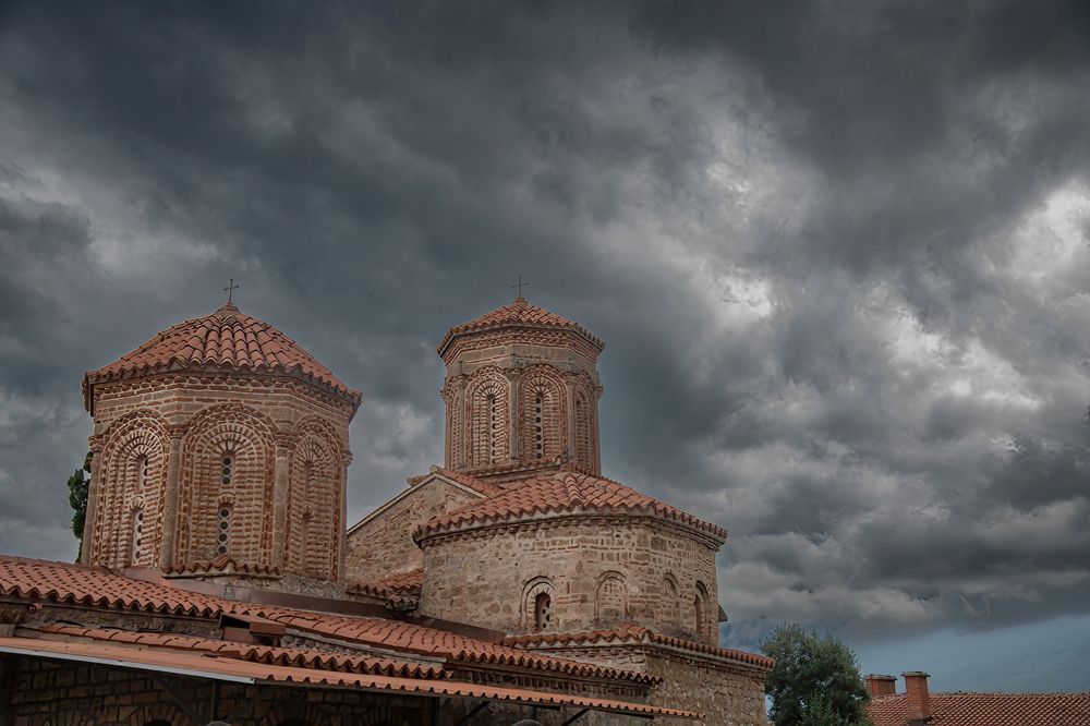 storm clouds above monastery
