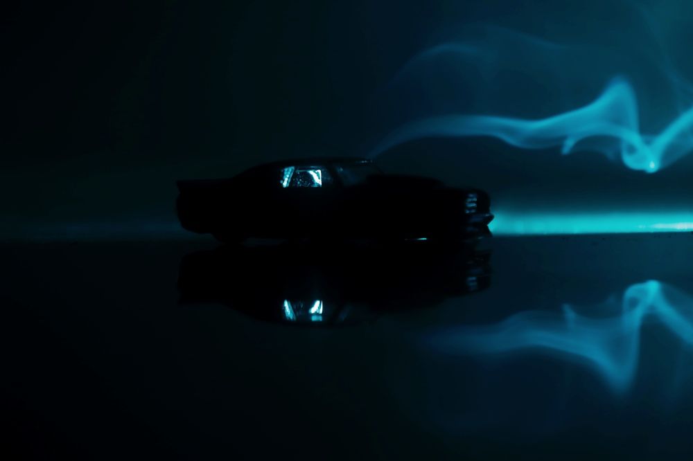 A car with smoke on the back