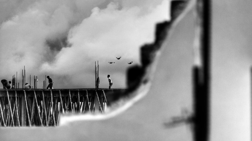Workers working on the rooftop
