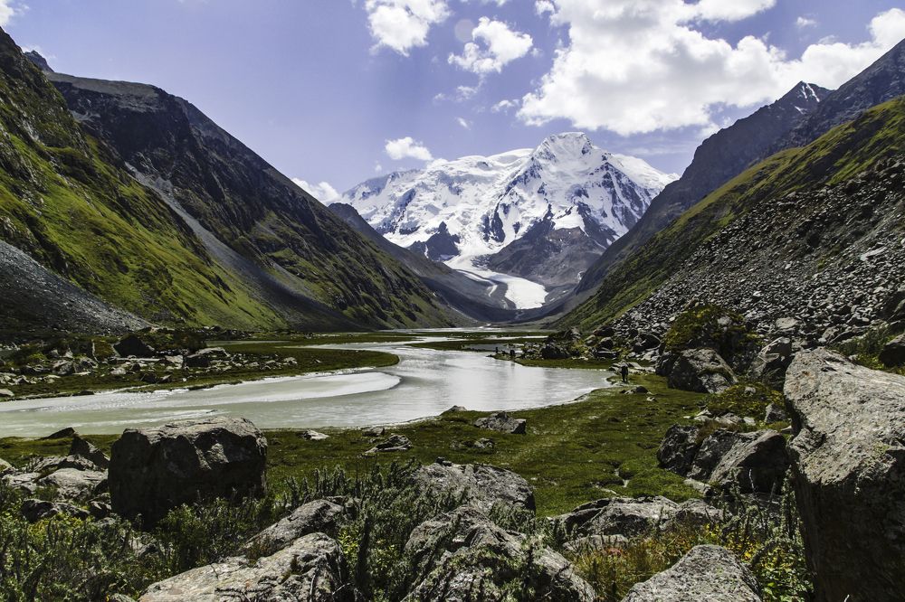 view of the Karakol mountain from the river valley