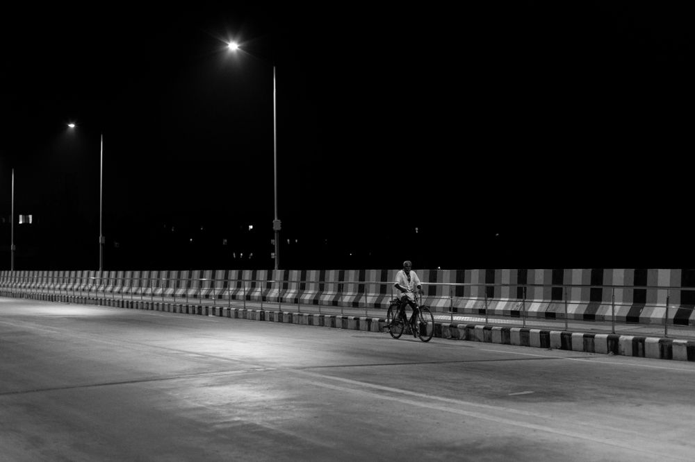 Following the leading line of the bridge.