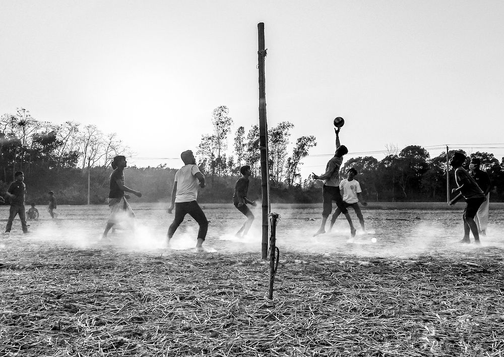 Playing volleyball match