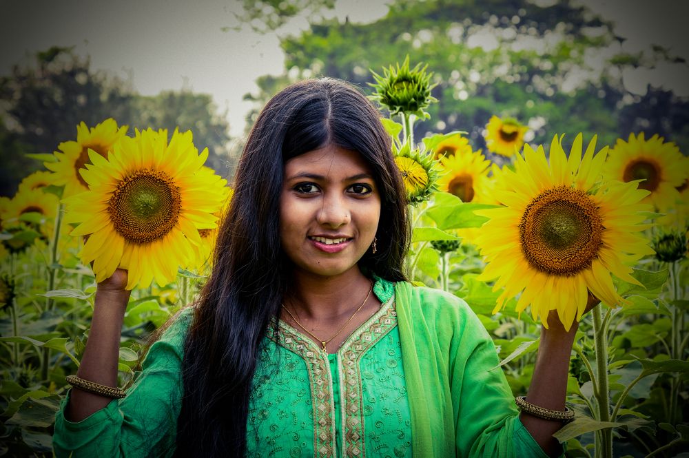 A Girl with Sunflower