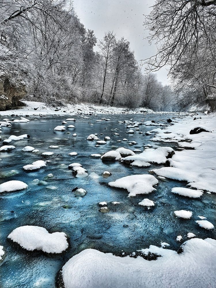 Mountain river in ice