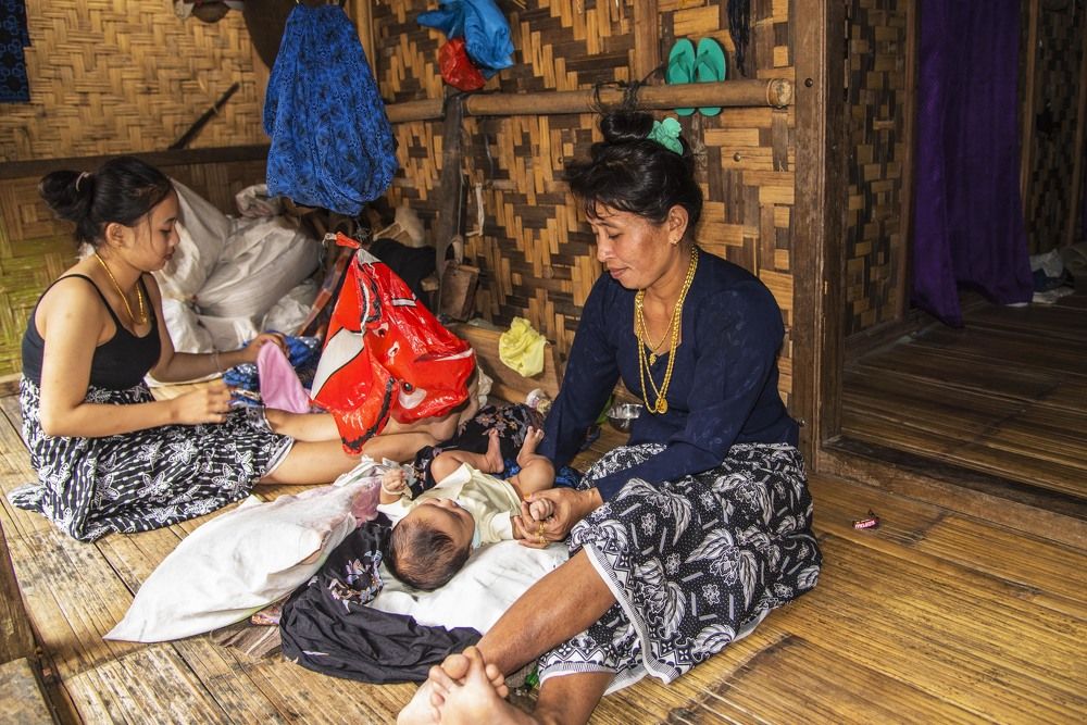 Grandmother, mother and child of a Baduy tribal family