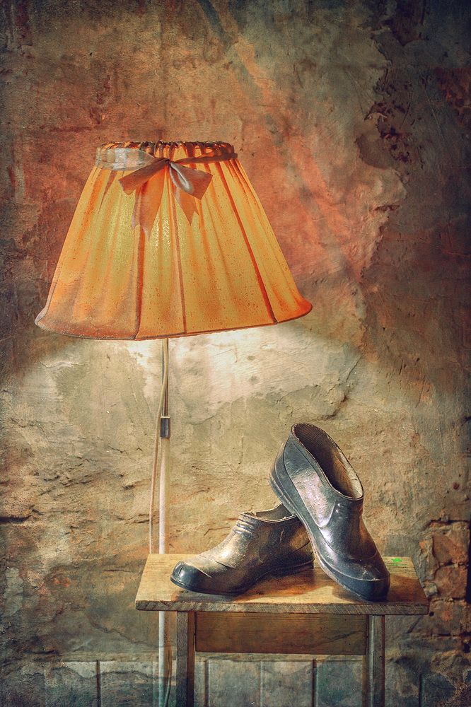 Galoshes under a lampshade
