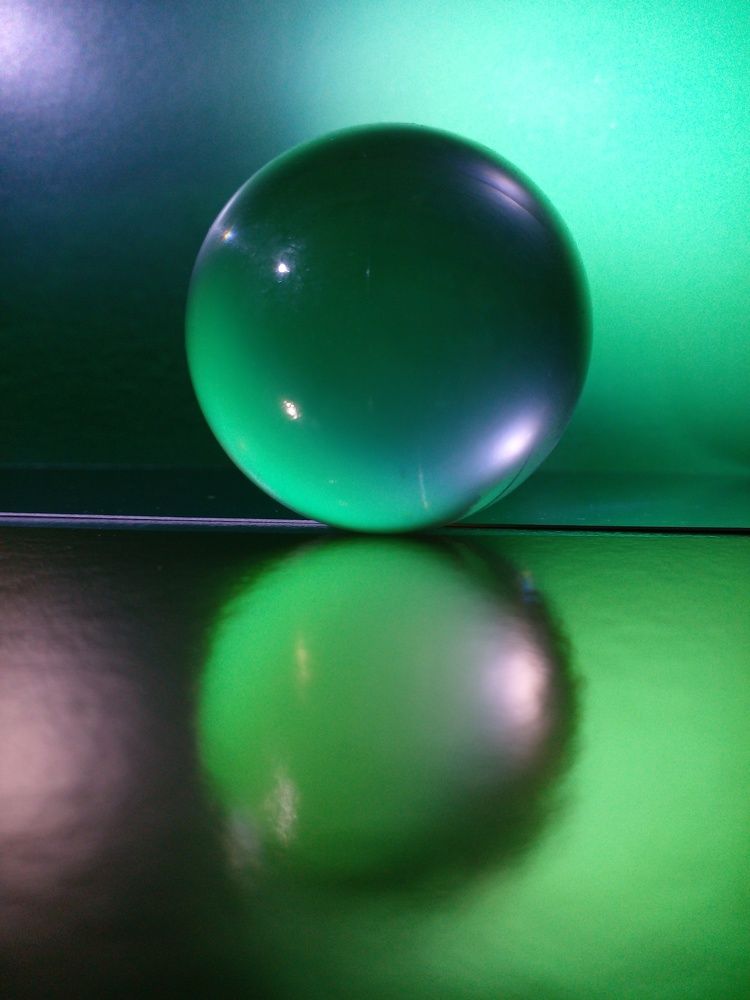 Green Sphere in Reflection.