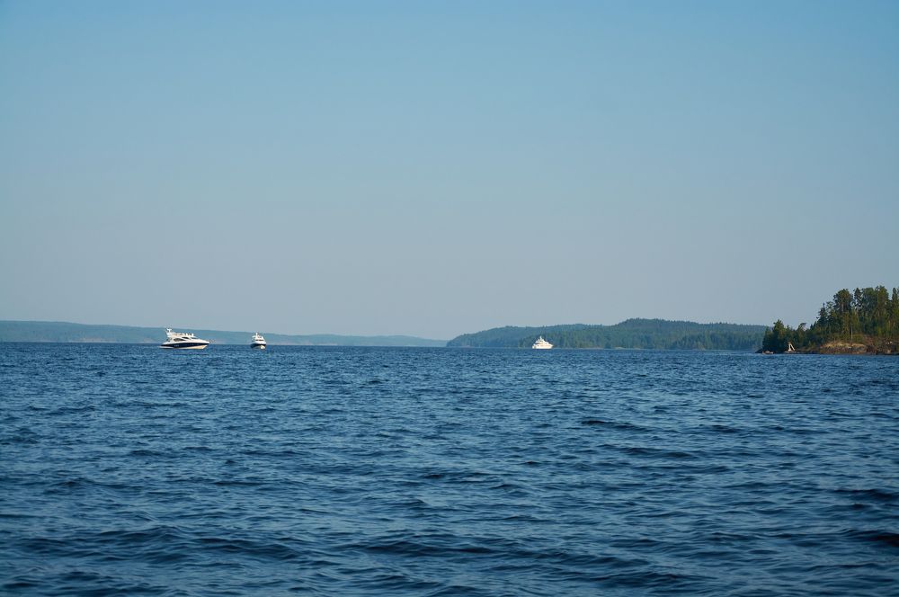 boats in the blue space (Ladoga skerries, lake Ladoga)
