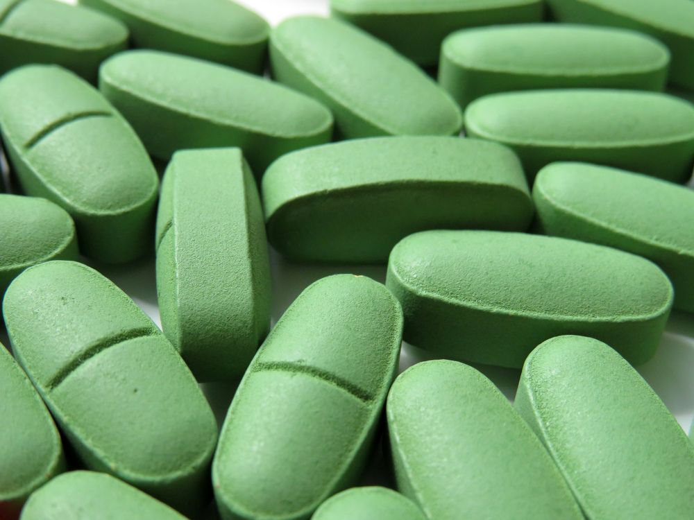 Green pills close up