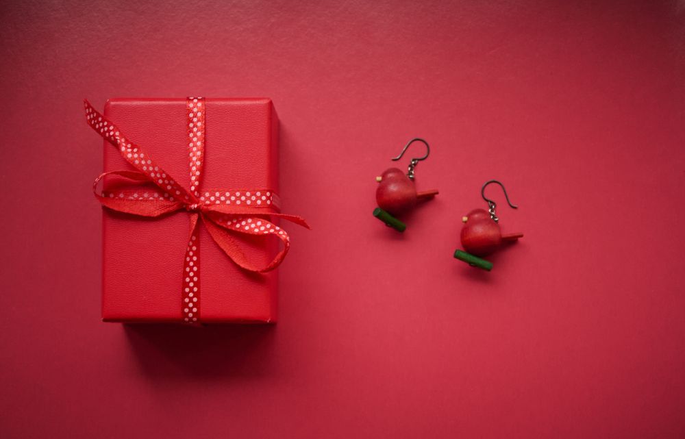 red gift on the red background