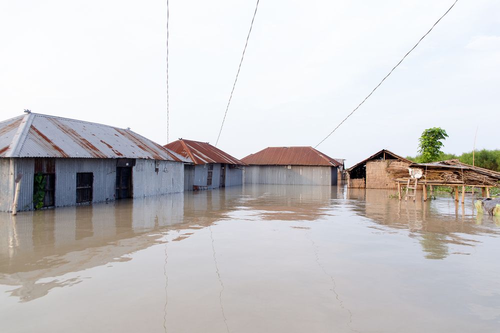 submerged houses in flood