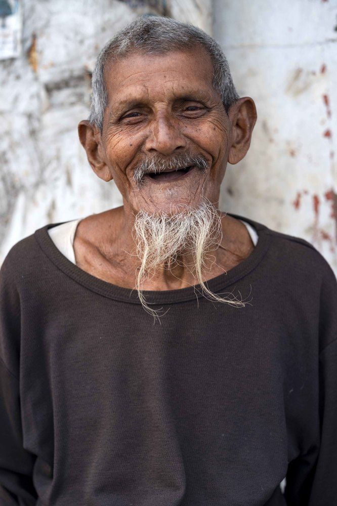 Hardship Hurts but Smile Wins