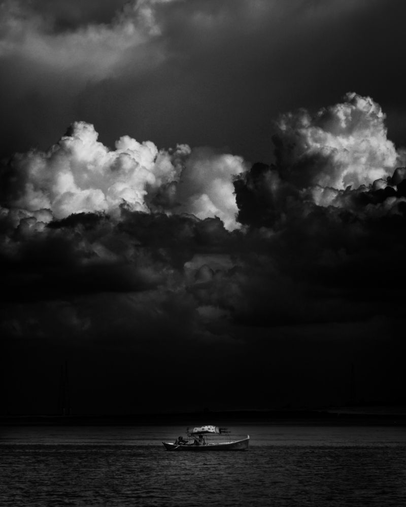 Traveling under stormy clouds