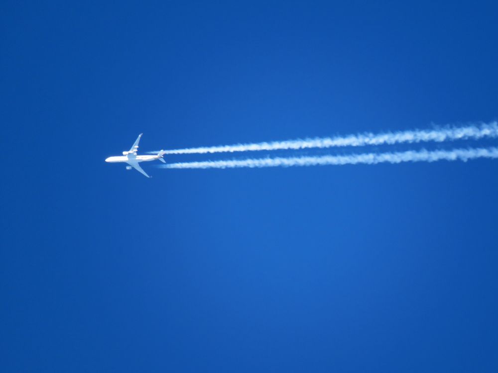 Airplane in the blue sky