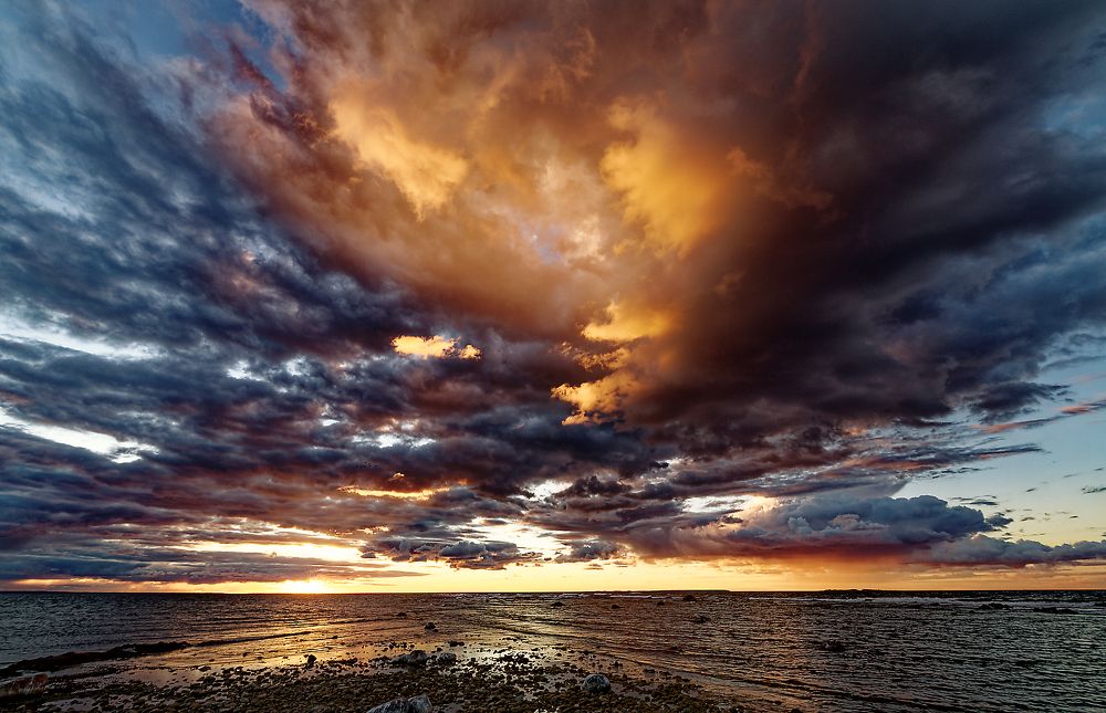 The light of the passing day.