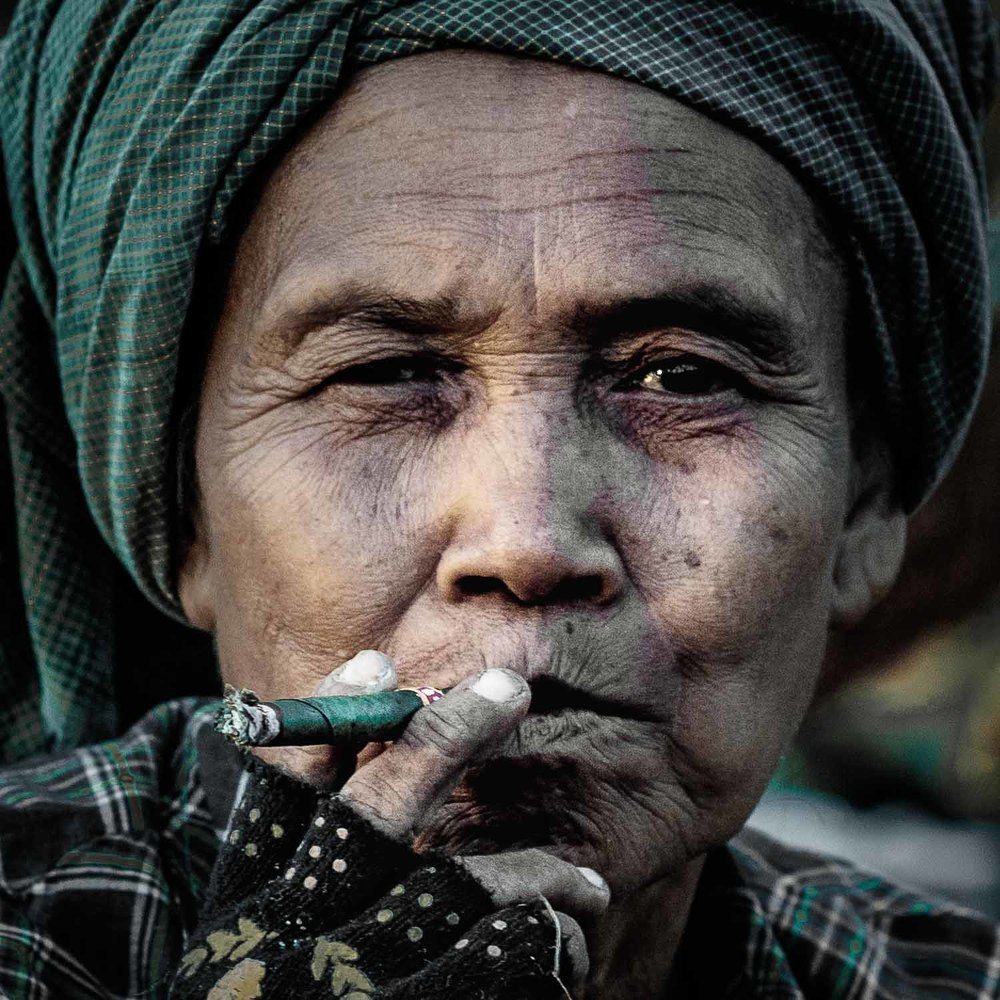 A smoke break during the peanut harvest, Bagan, Myanmar