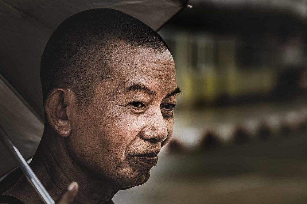 A monk on a street in Yangon, Myanmar