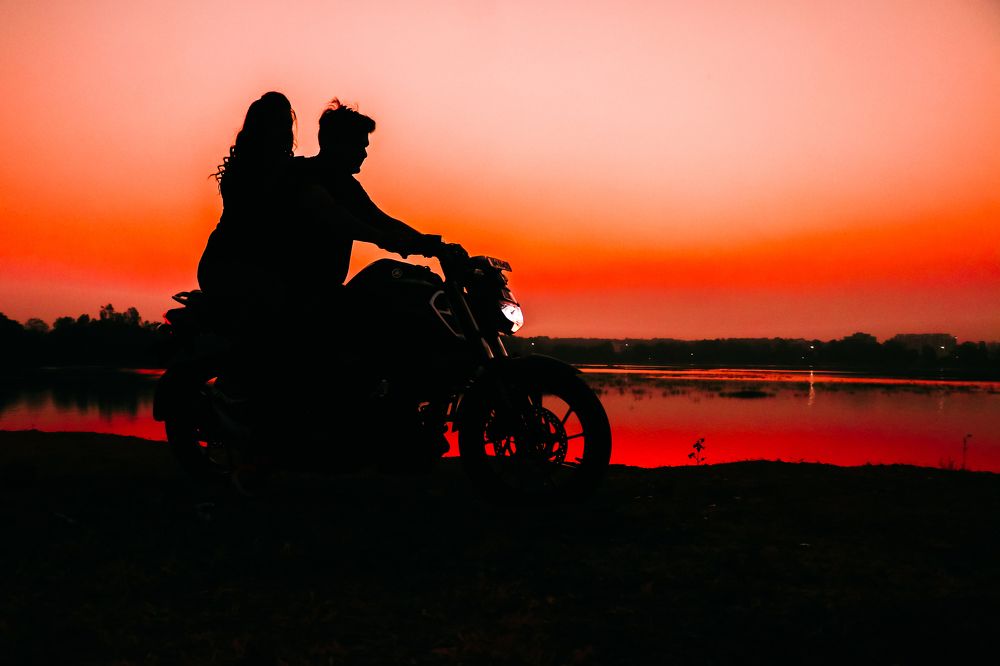Romantic Red Sunset and Couple Silhouettes