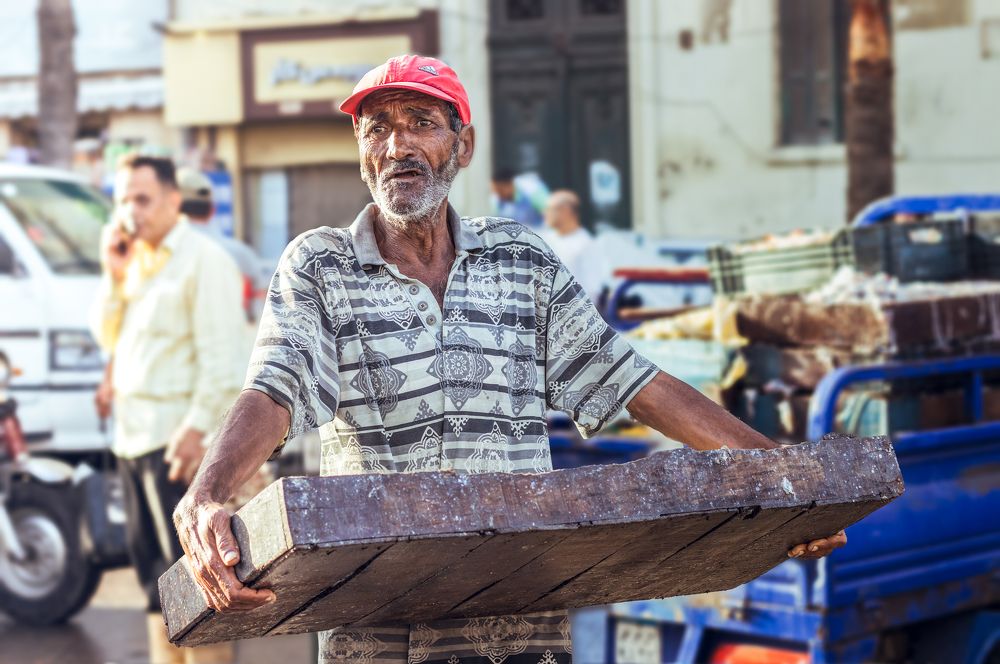 A photograph of a fishmonger at Fish Market