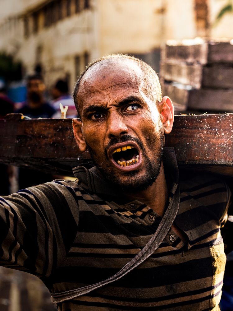 A photograph of a fishmonger at Fish Market