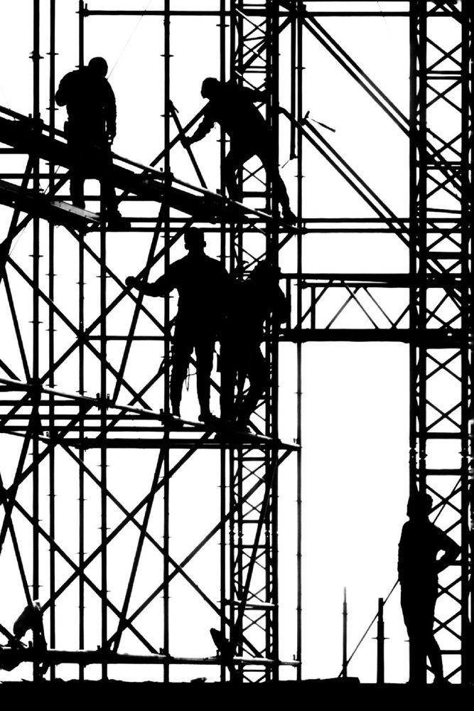 Men in the steel cage.