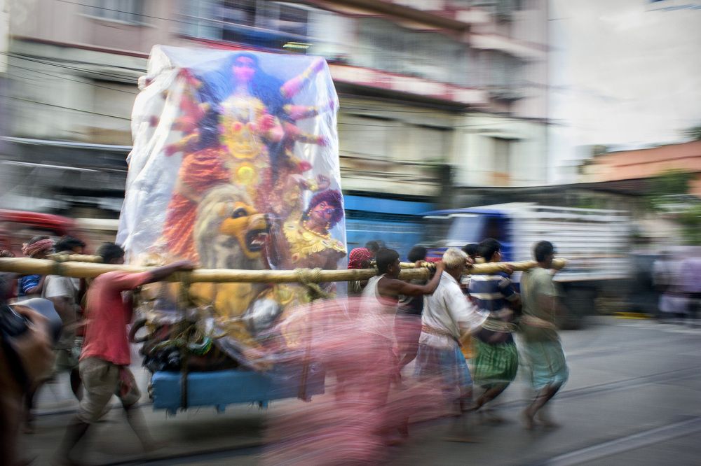 Carrying the Durga idol