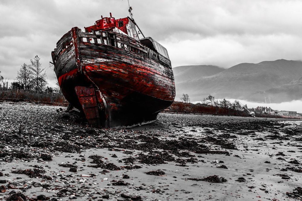 Fort William beached fishing boat Black and White with a hint of Red
