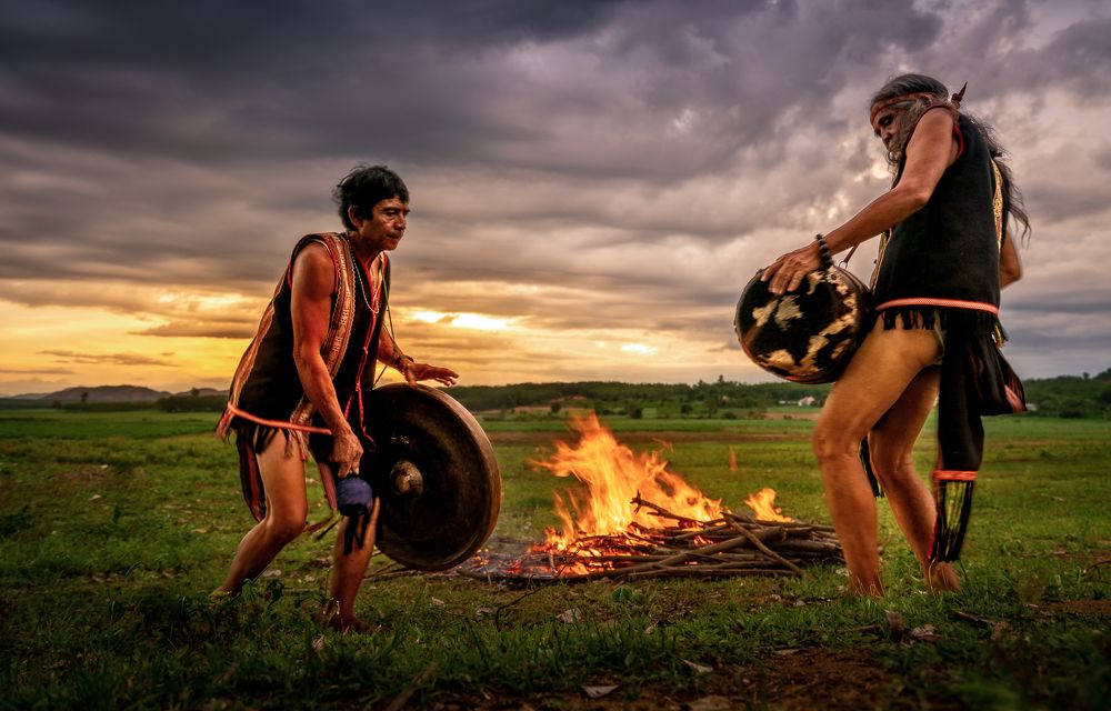 Gong and Drum performance around bonfire
