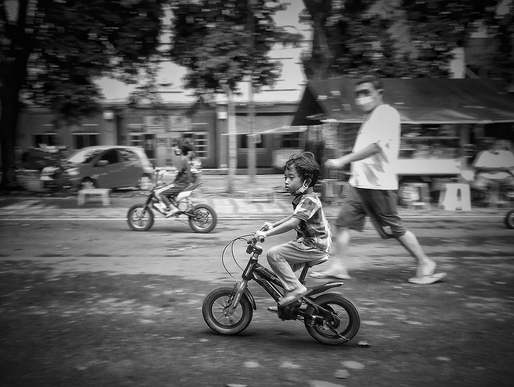 Kids ride bikes