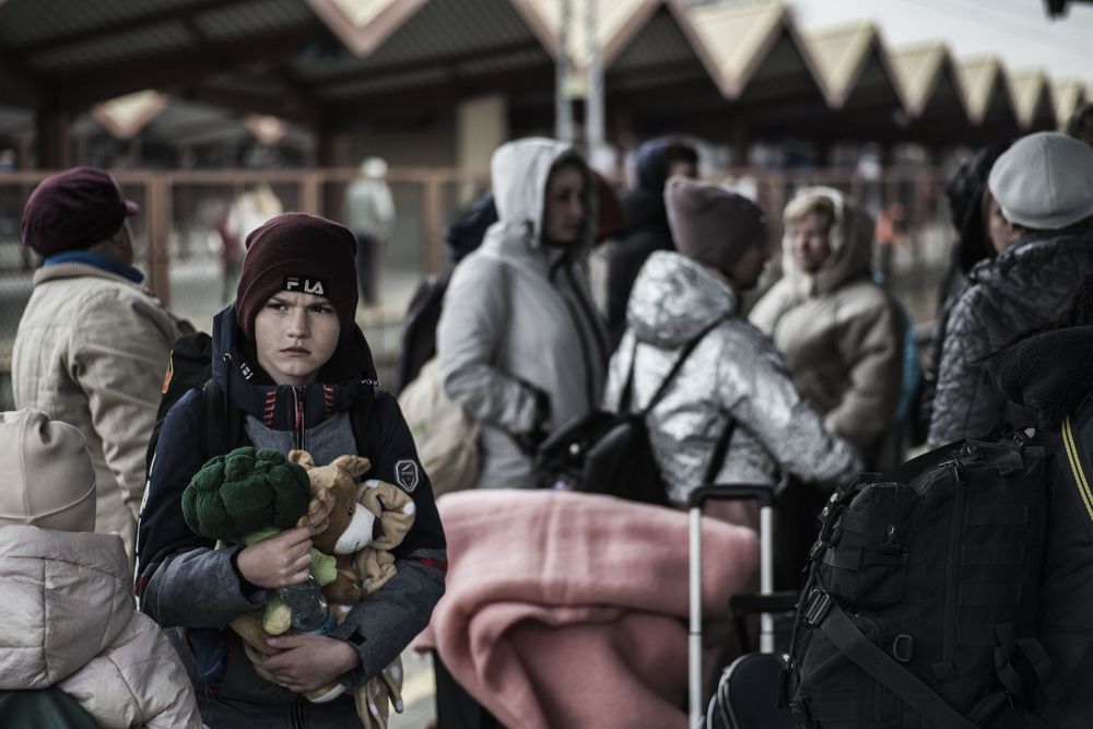 Ukrainian boy at the train station in Prezmyls, Poland.