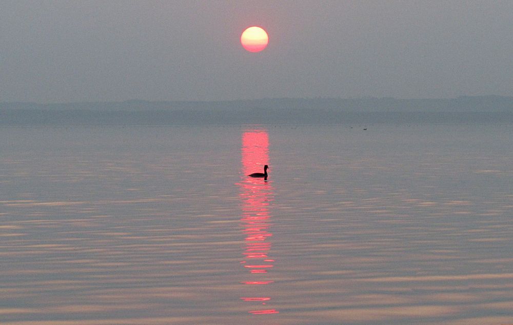 Жаркий закат на озере Аслы-куль