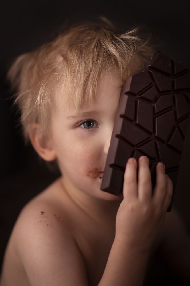 Little boy with a chocolate
