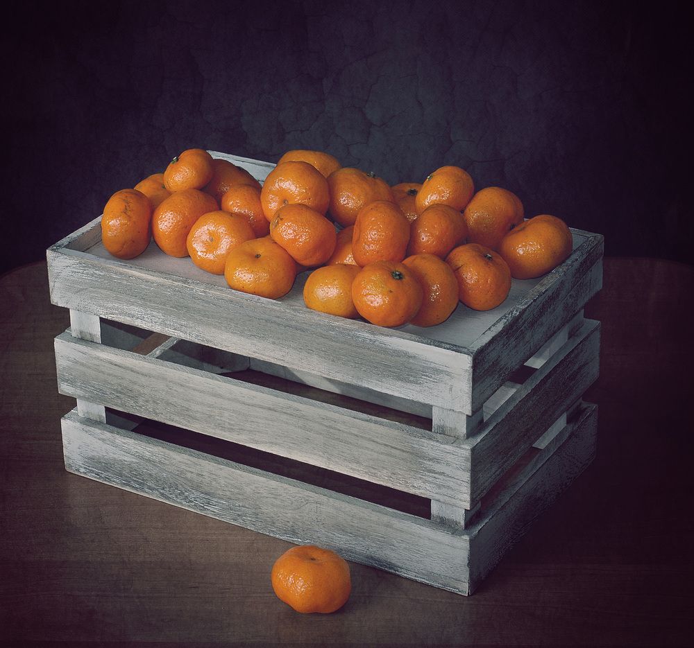 Tangerines on a box