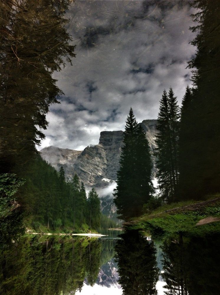 Upside down photography: reflection of a landscape in an upside down lake