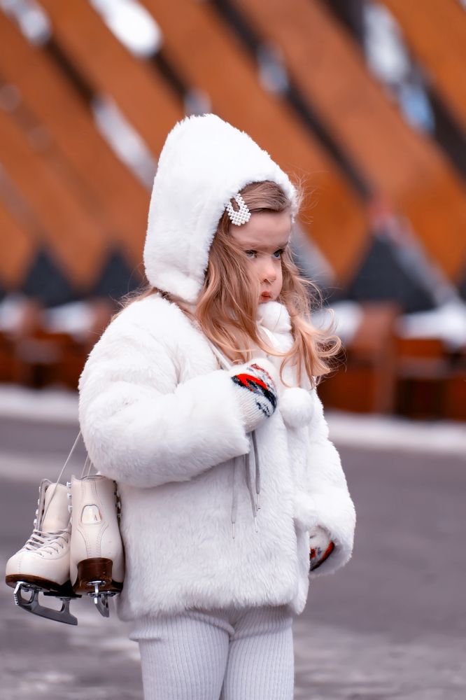 Малышка и коньки