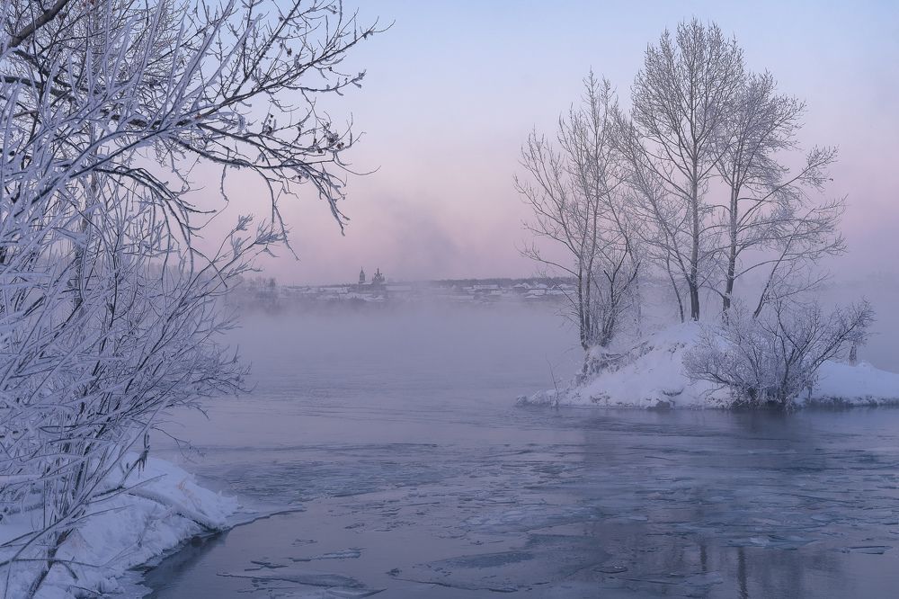 The old church in the fog at sunset