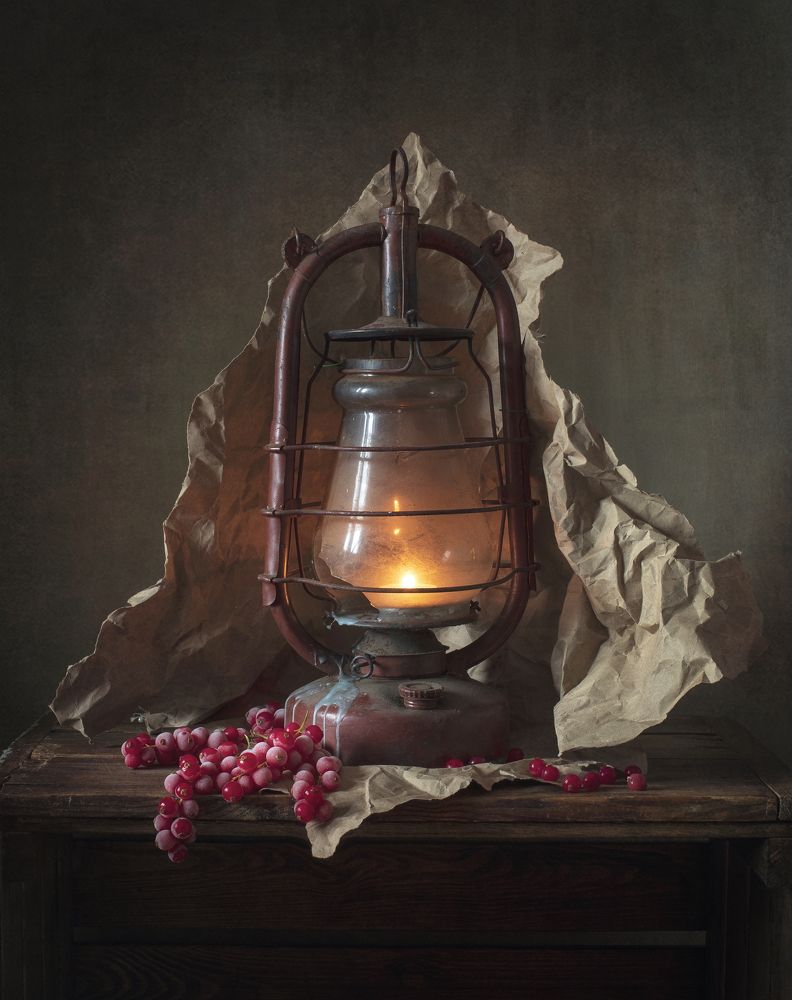 Old lantern and red berries