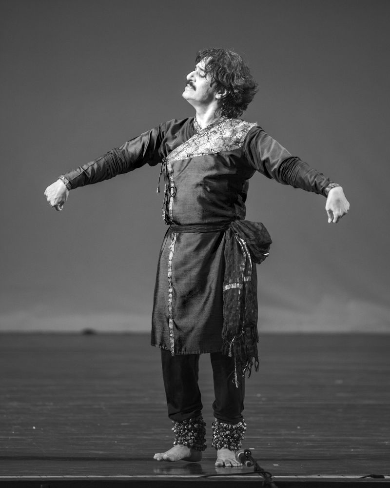 A black costume dancer